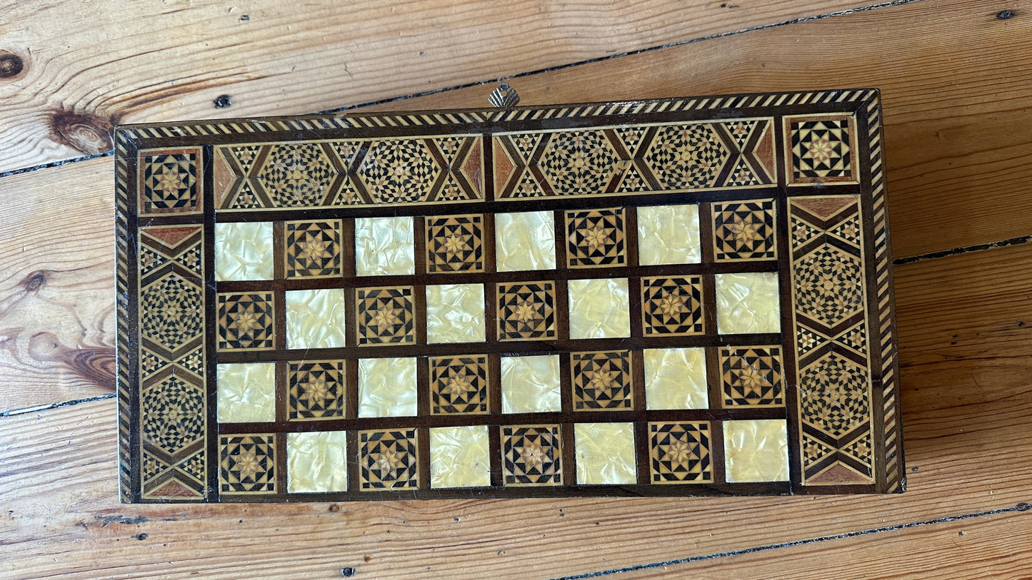 Vintage Syrian/Egyptian mosaic marquetry chess and backgammon board featuring intricate inlaid mother-of-pearl