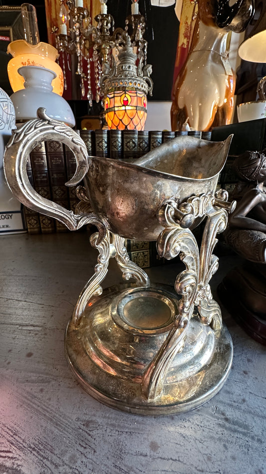 Vintage silver-plated tilting gravy boat with elaborate matching stand