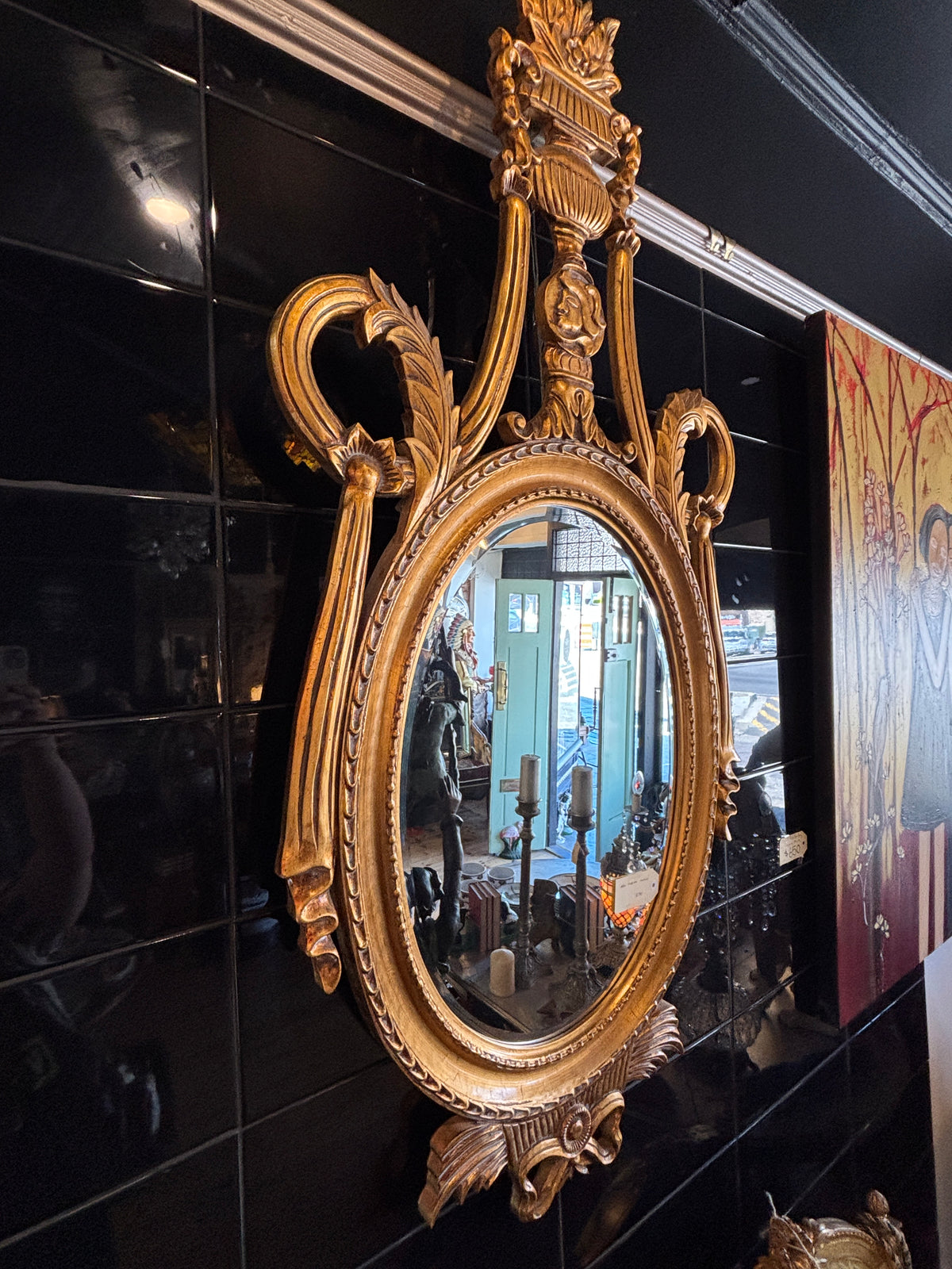 Neoclassical Style Gilt Oval Mirror with Urn Crest