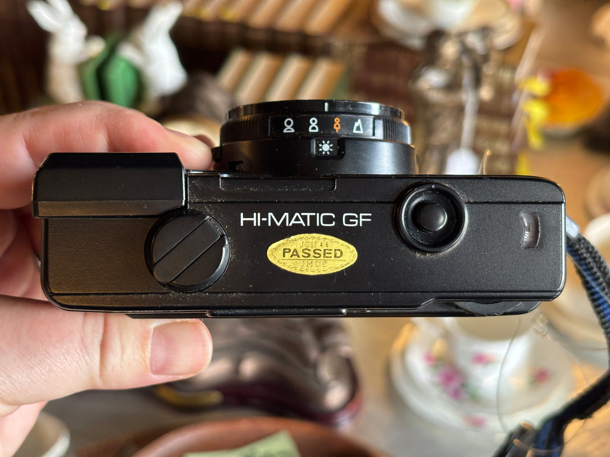 Minolta Hi-Matic GF (black) with original cap and soft case
