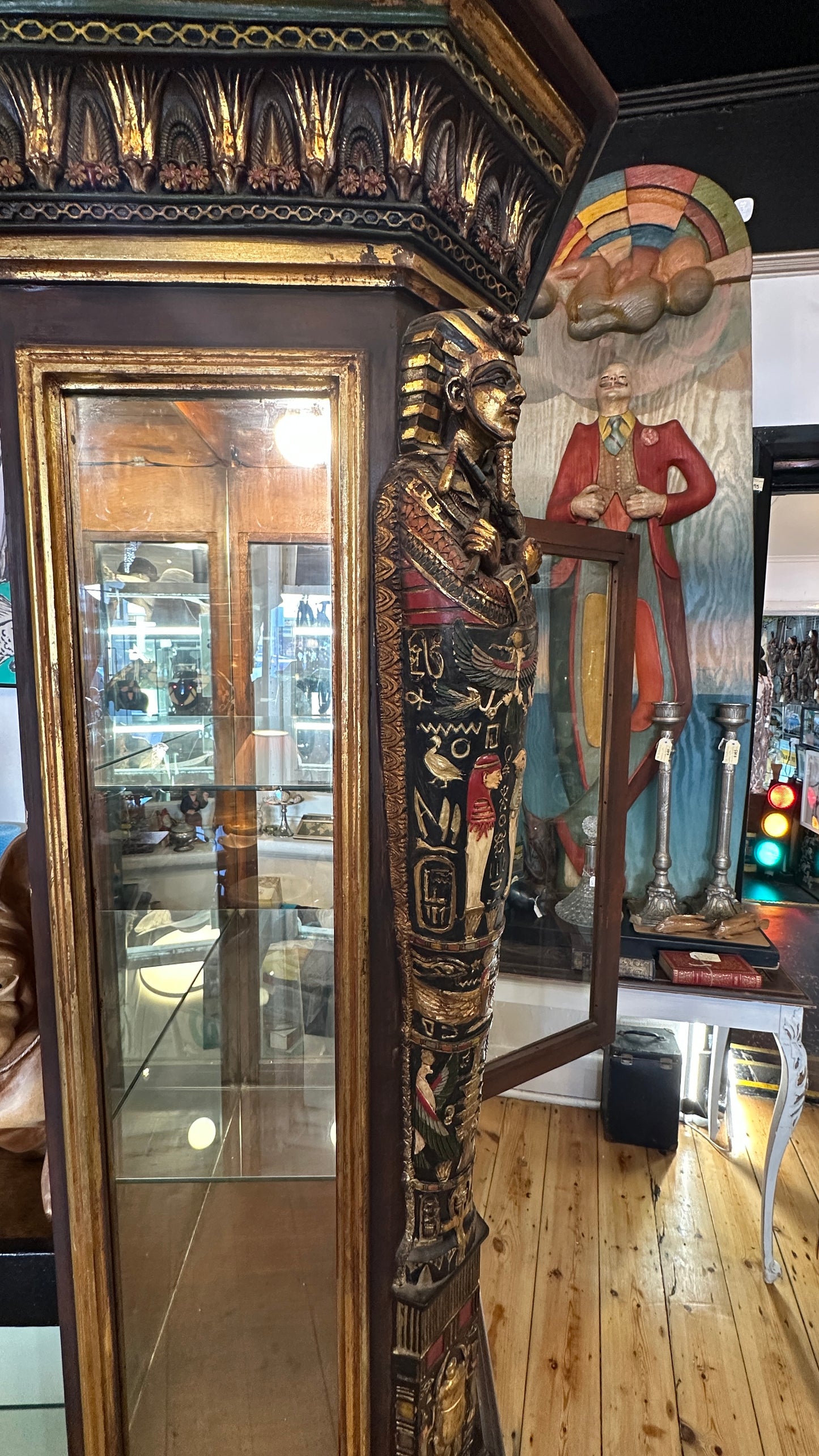 Egyptian Sarcophagus style display cabinet, with glass shelves and interior lighting