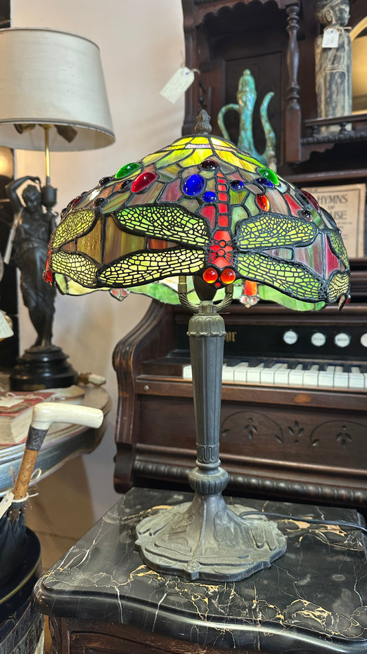 Tiffany-style Stained Glass Dragonfly table lamp with a bronze-colored base.