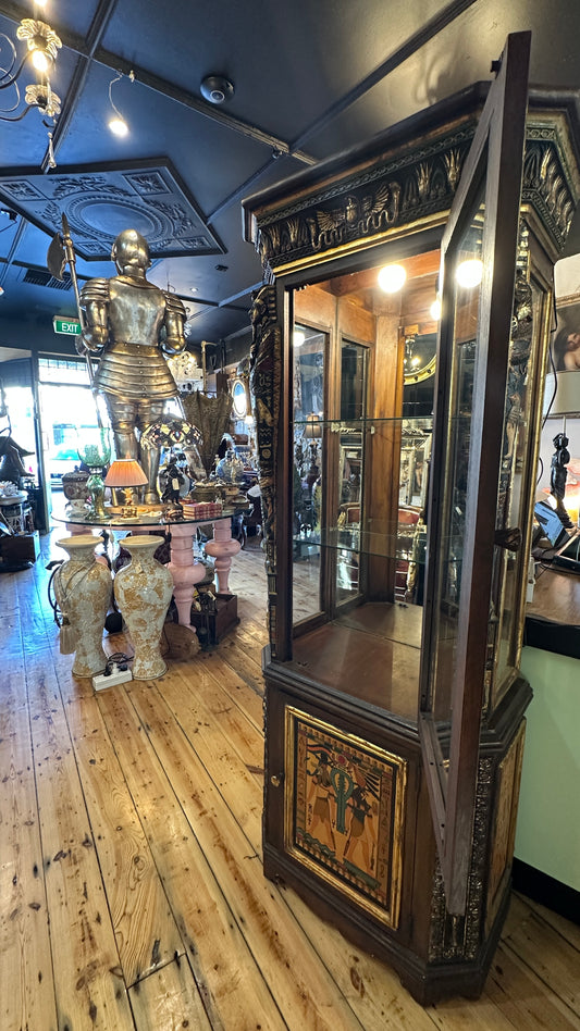 Egyptian Sarcophagus style display cabinet, with glass shelves and interior lighting