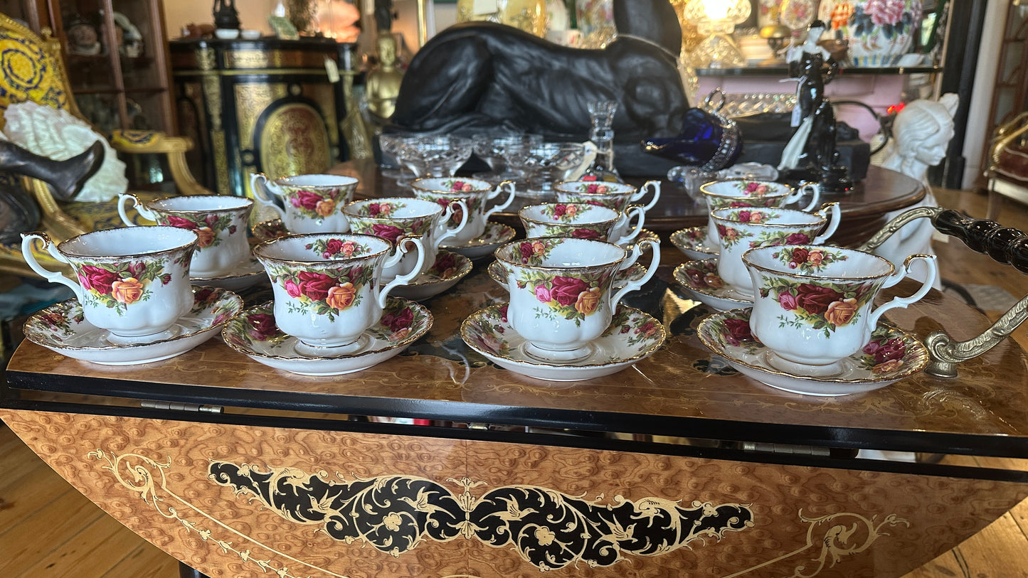 Teacup and saucer set in Prince Albert's “Old Country Roses” pattern trimmed in 22k gold