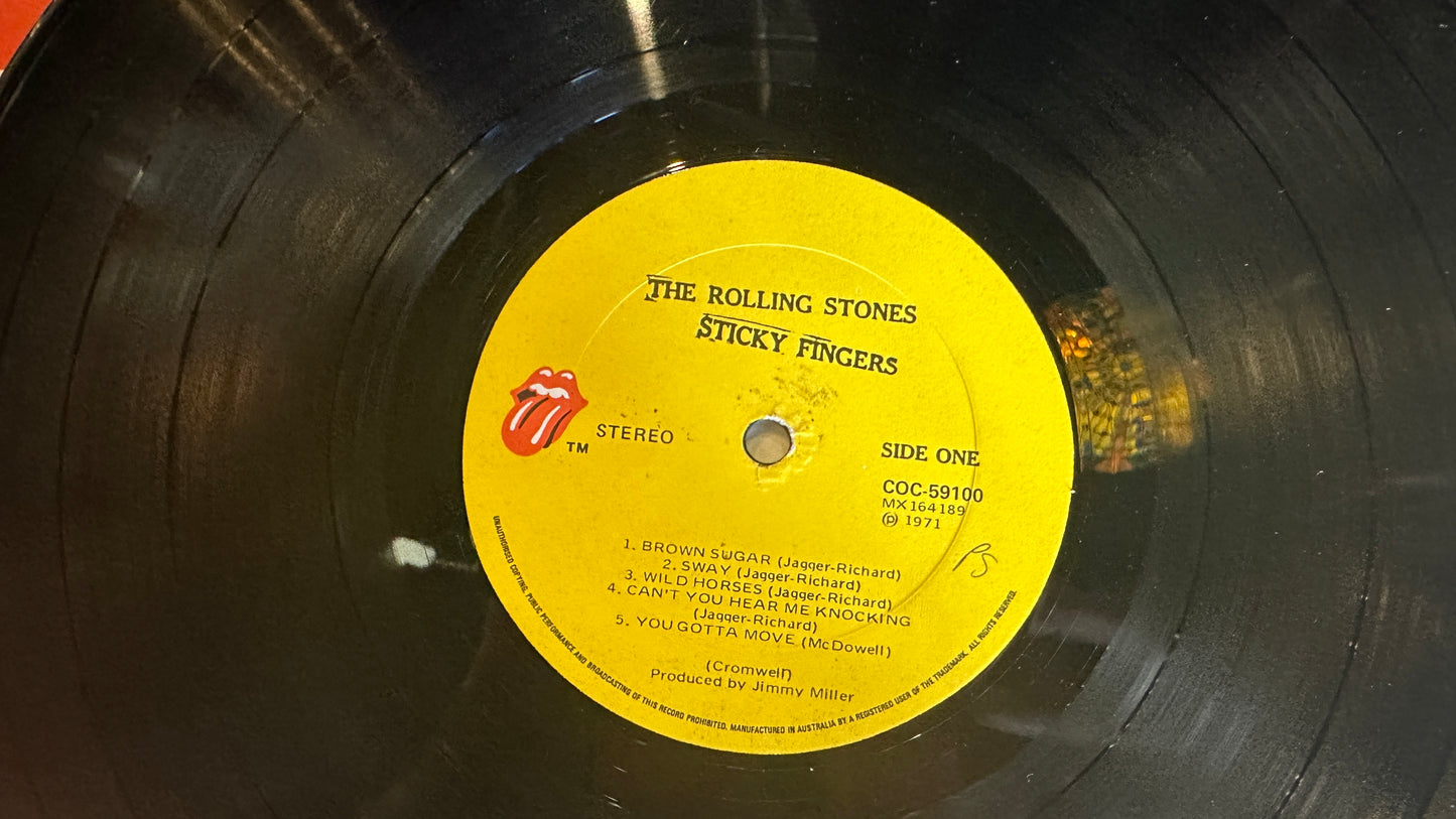 Rolling Stones vinyl “Sticky Fingers”featuring the iconic Andy Warhol design
