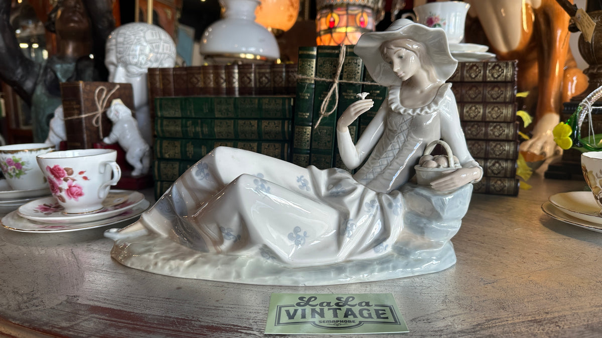 Vintage NAO by Lladro Porcelain Figurine "Lady Sitting With Flowers"