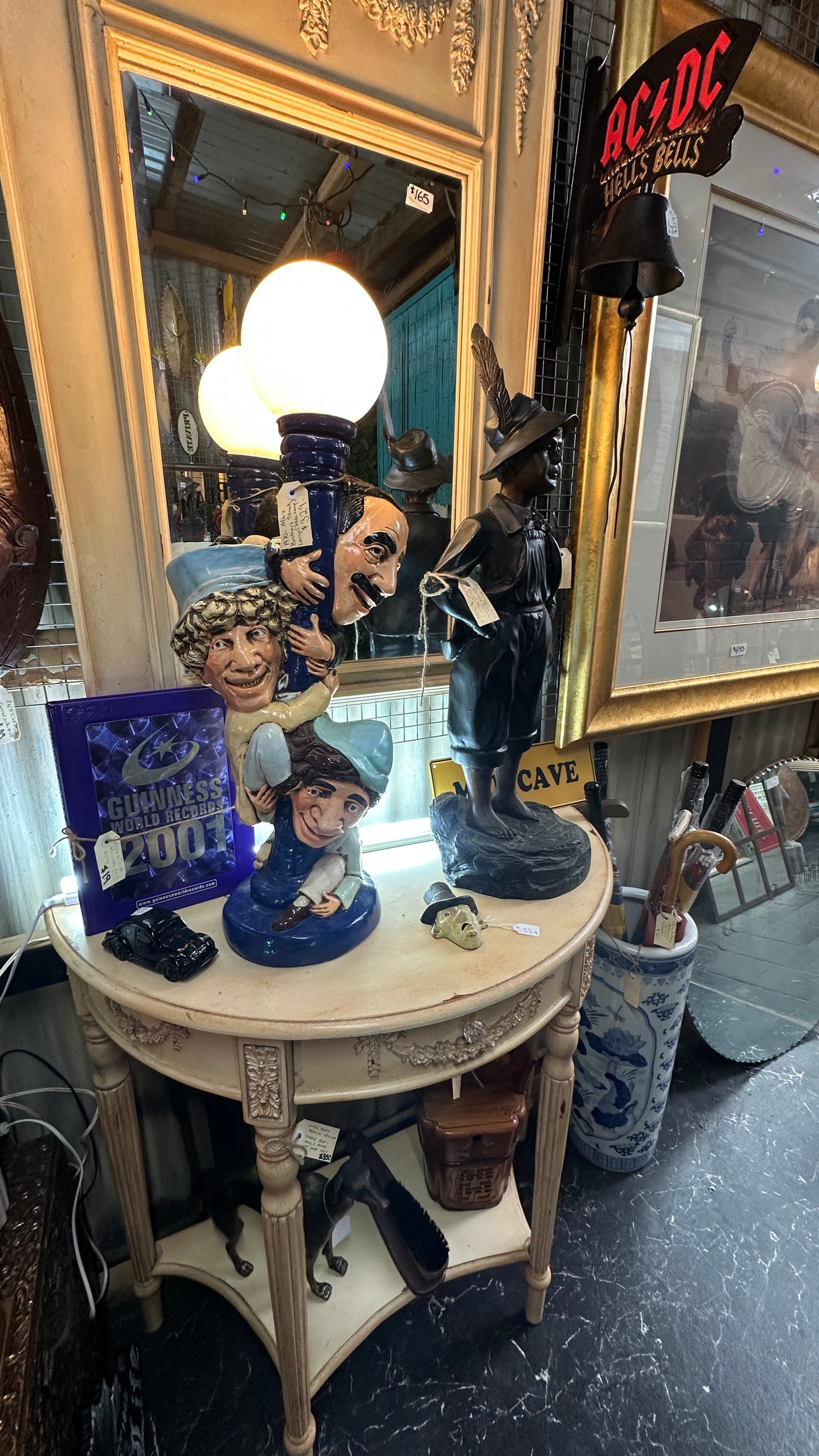 Vintage lamp plaster chalkware figurine of the Marx Brothers (Groucho, Chico, and Harpo) climbing a lamppost