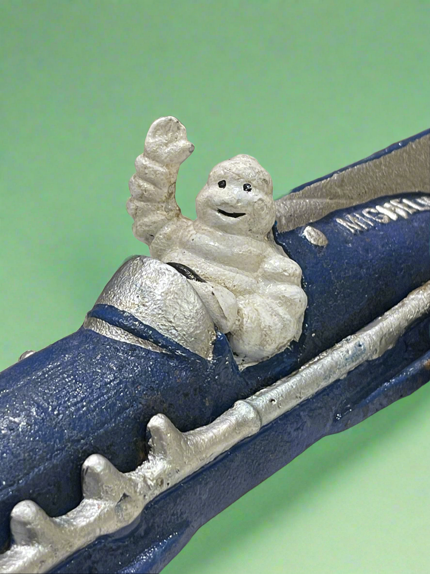 Michelin Man Racing Car Cast Iron Figure