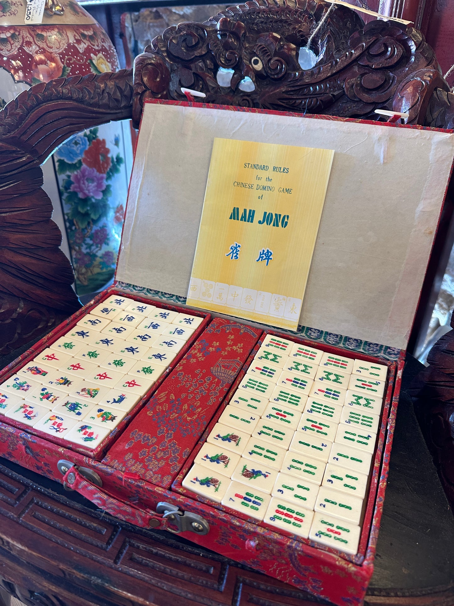 Vintage Mahjong set, including red brocade silk case and "Standard Rules" booklet