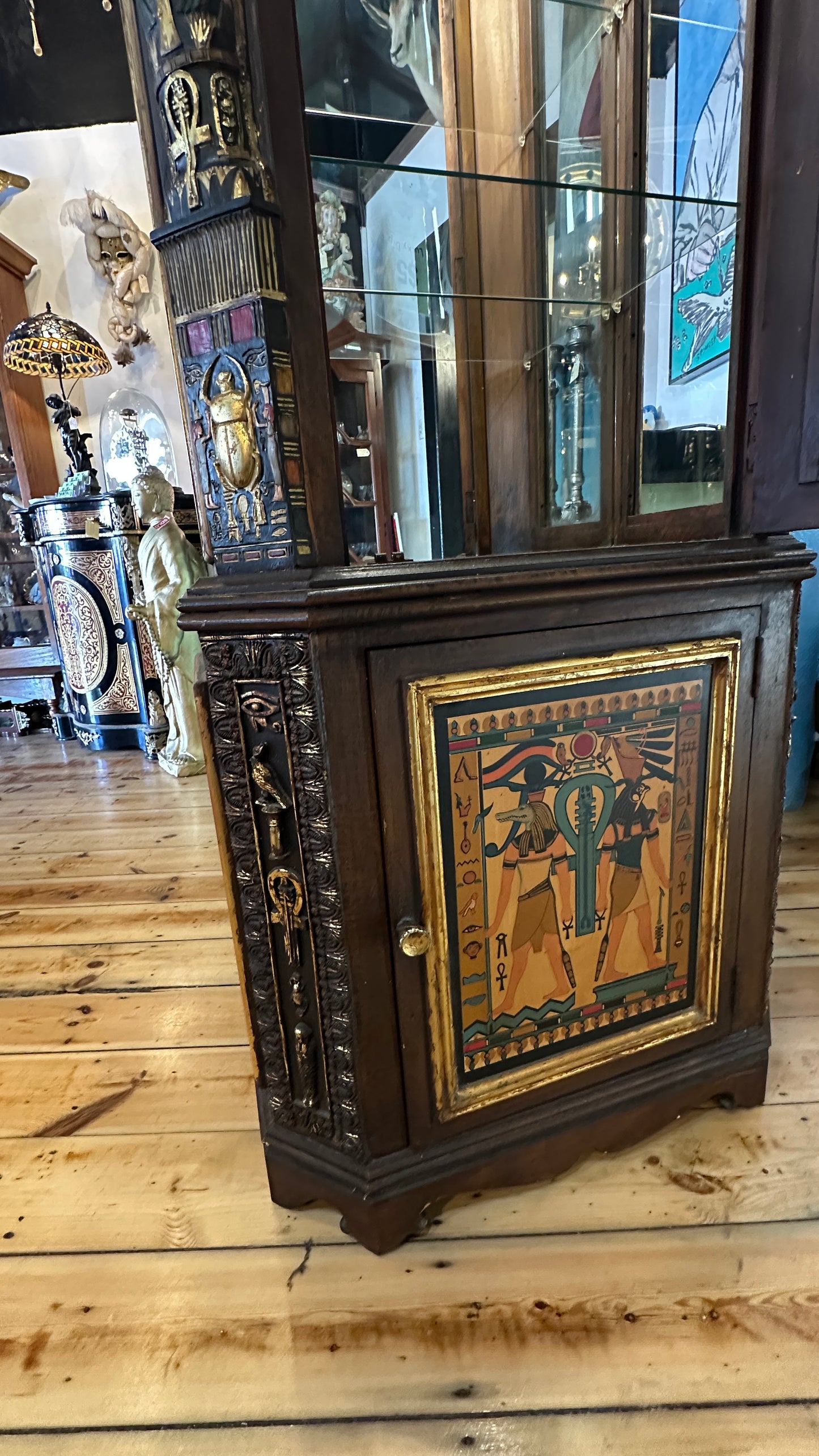 Egyptian Sarcophagus style display cabinet, with glass shelves and interior lighting