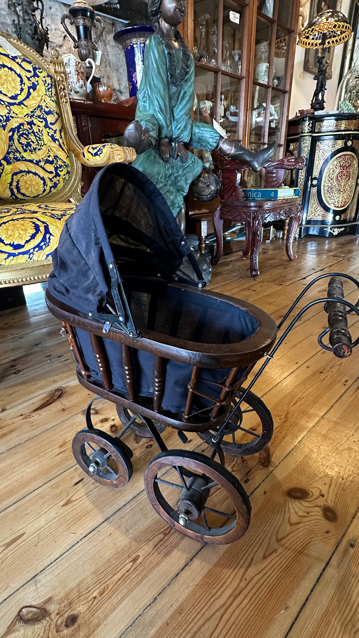 Vintage or Victorian-style doll pram