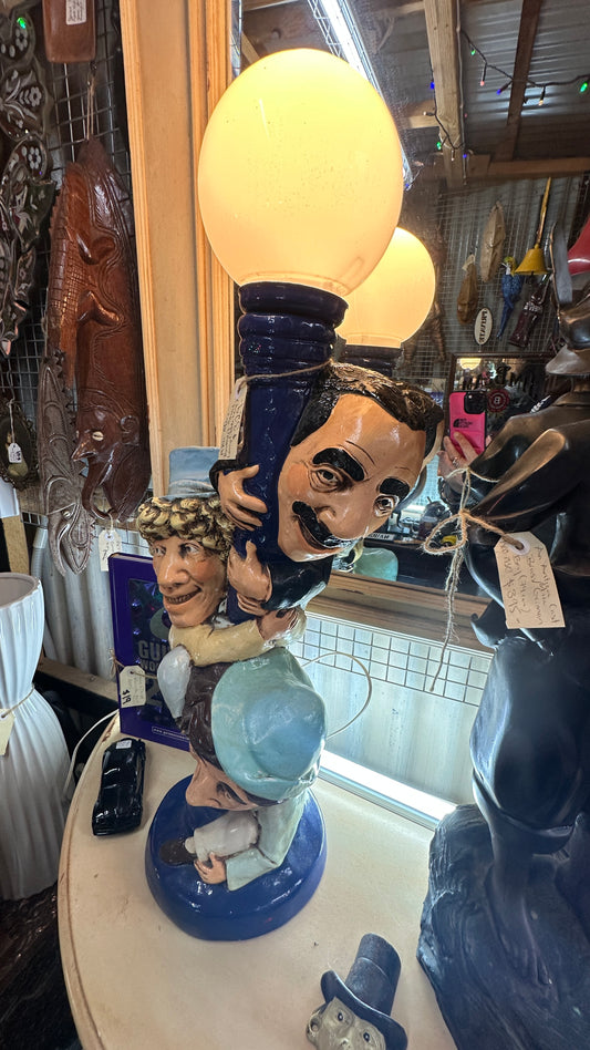 Vintage lamp plaster chalkware figurine of the Marx Brothers (Groucho, Chico, and Harpo) climbing a lamppost