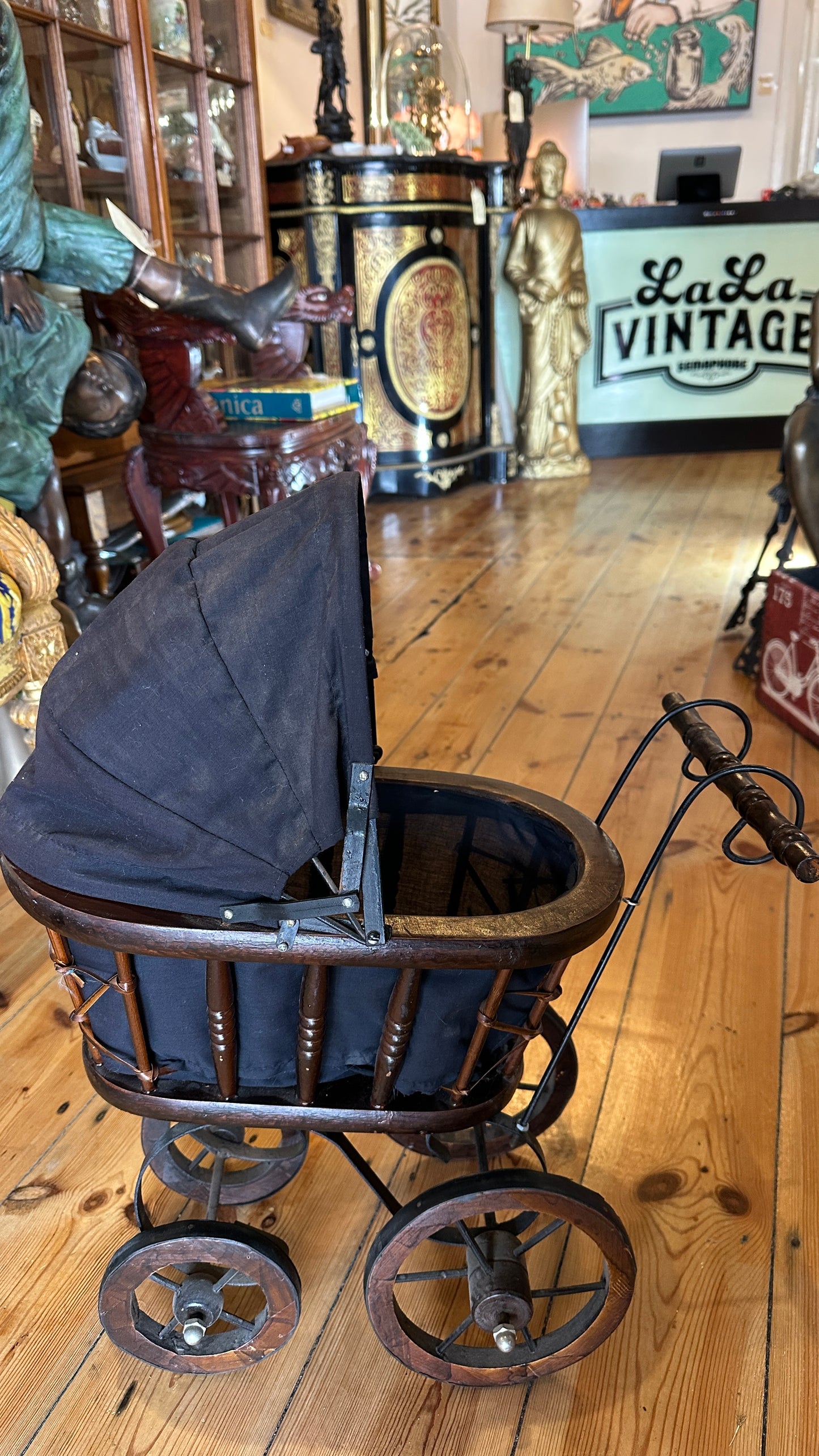 Vintage or Victorian-style doll pram
