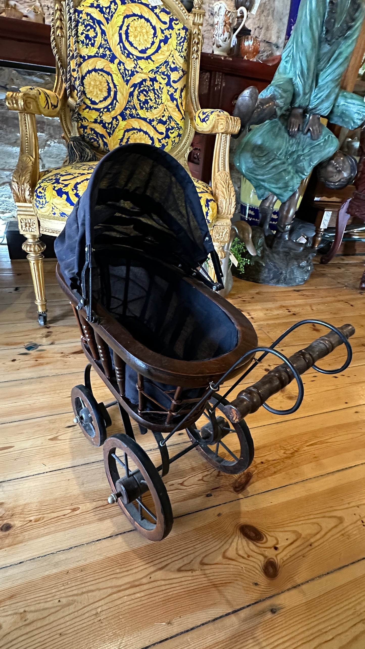 Vintage or Victorian-style doll pram