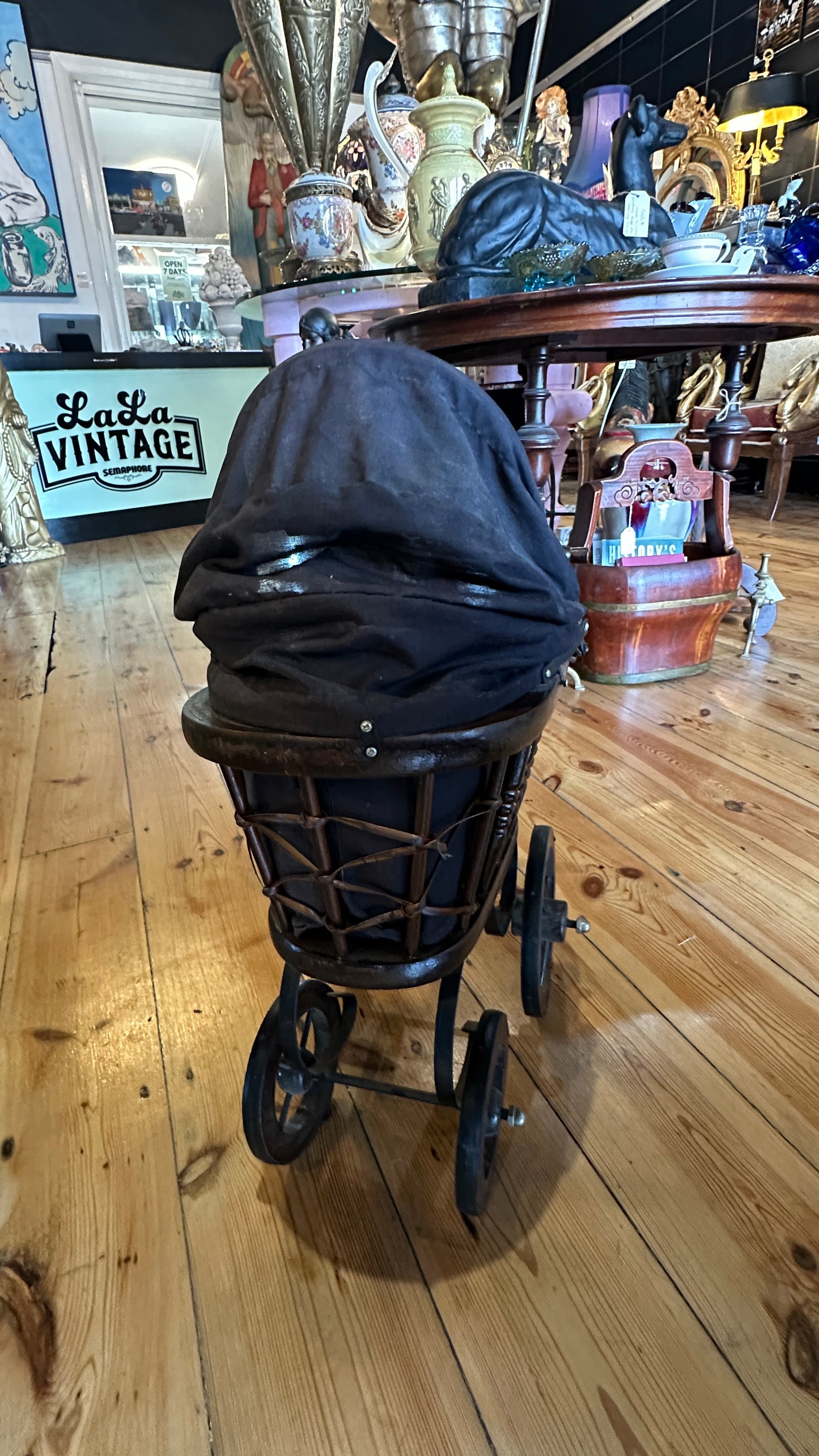 Vintage or Victorian-style doll pram
