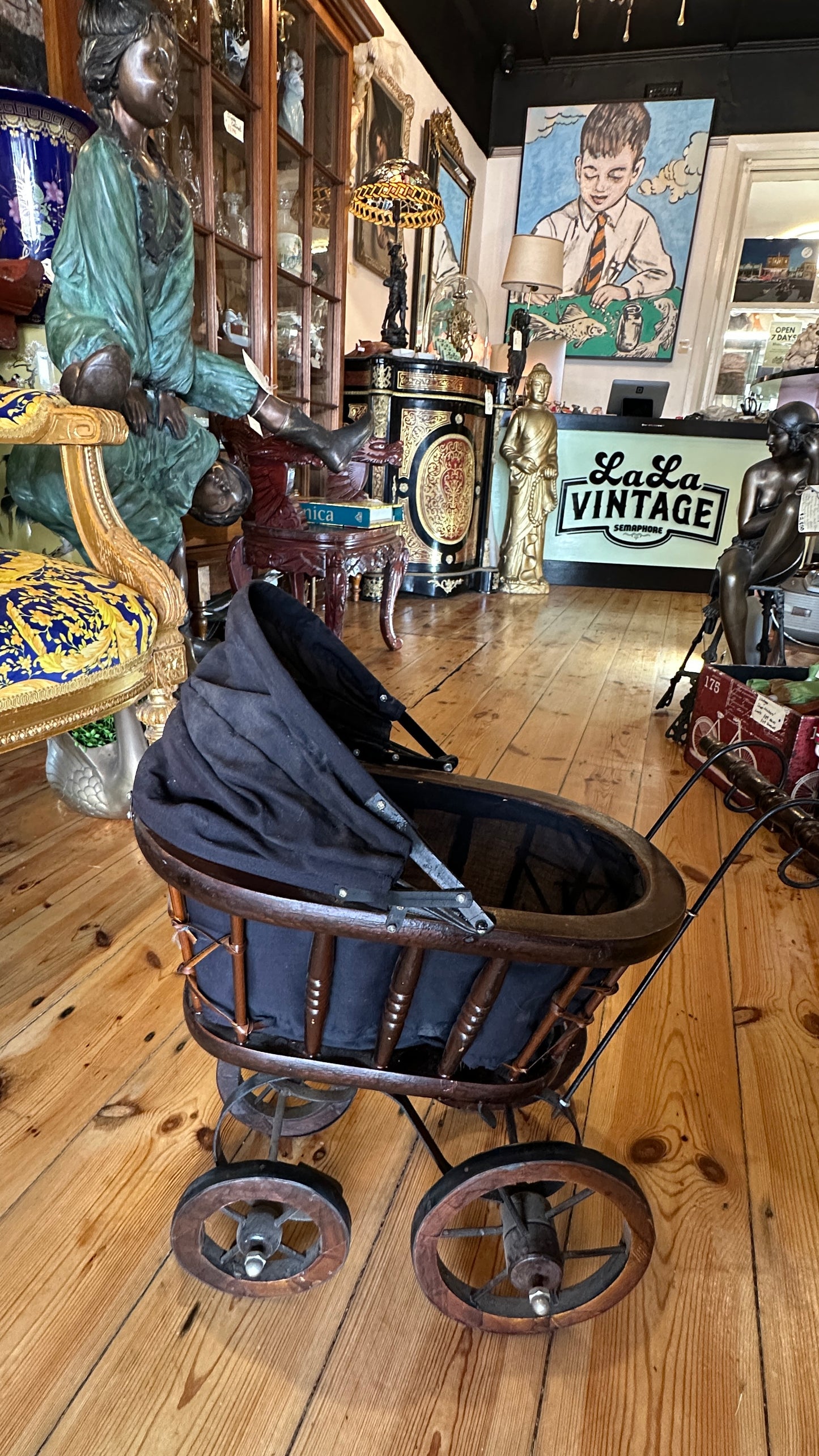 Vintage or Victorian-style doll pram