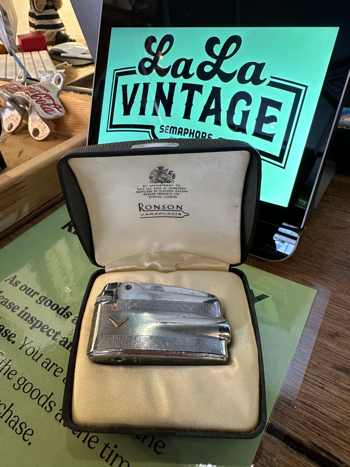 Vintage Ronson Varaflame butane lighter, displayed in its original presentation case.