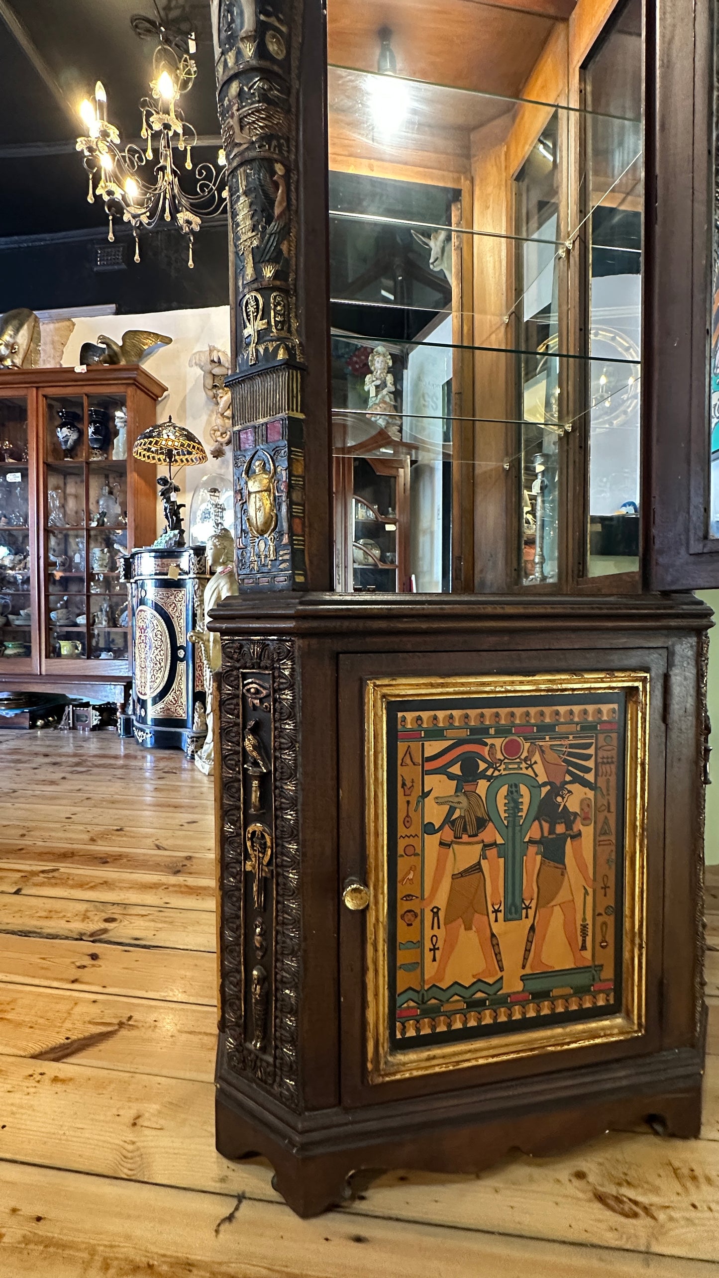 Egyptian Sarcophagus style display cabinet, with glass shelves and interior lighting