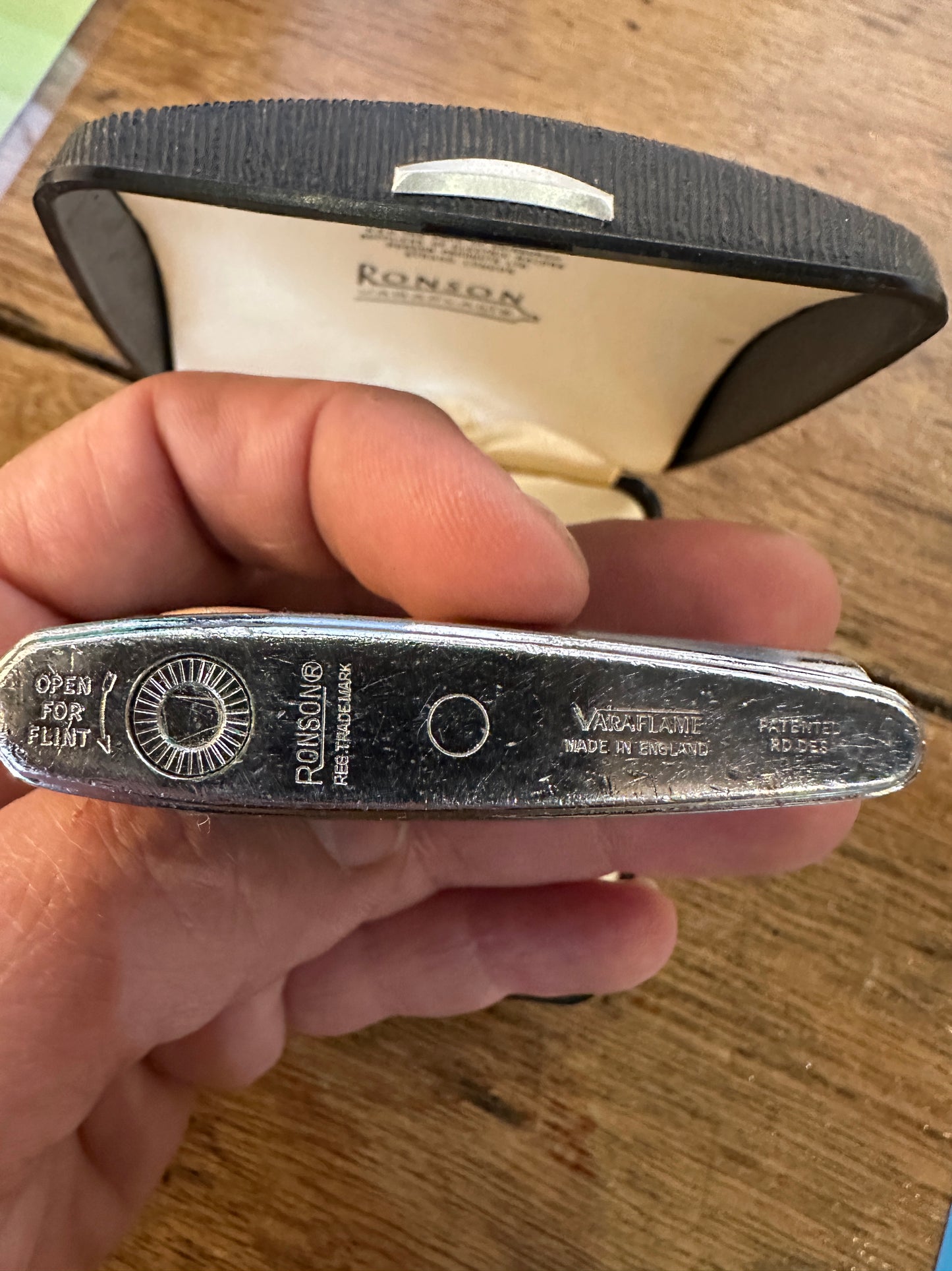 Vintage Ronson Varaflame butane lighter, displayed in its original presentation case.