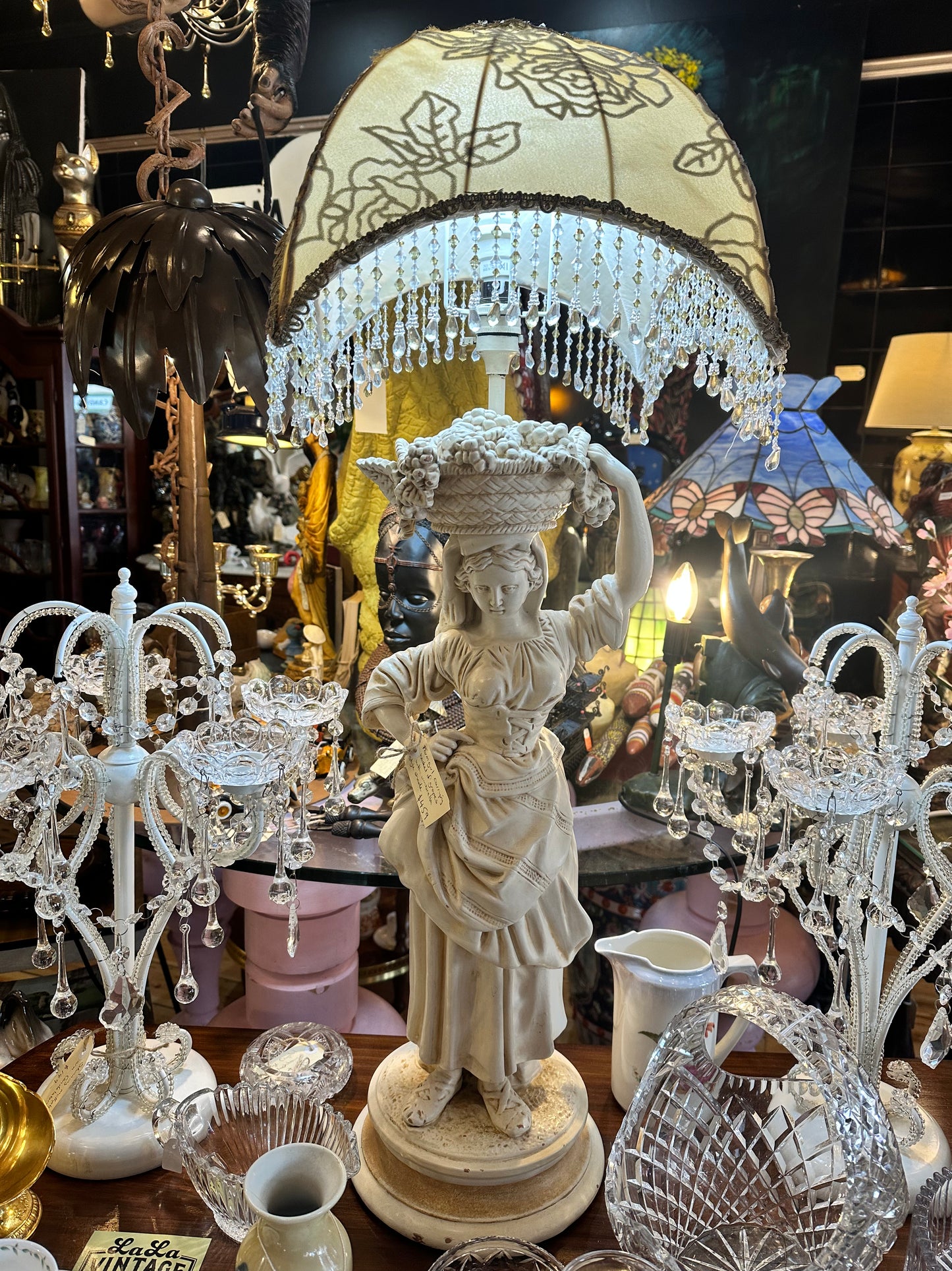 Beautiful Farm Girl Table Lamp carrying a basket of grapes