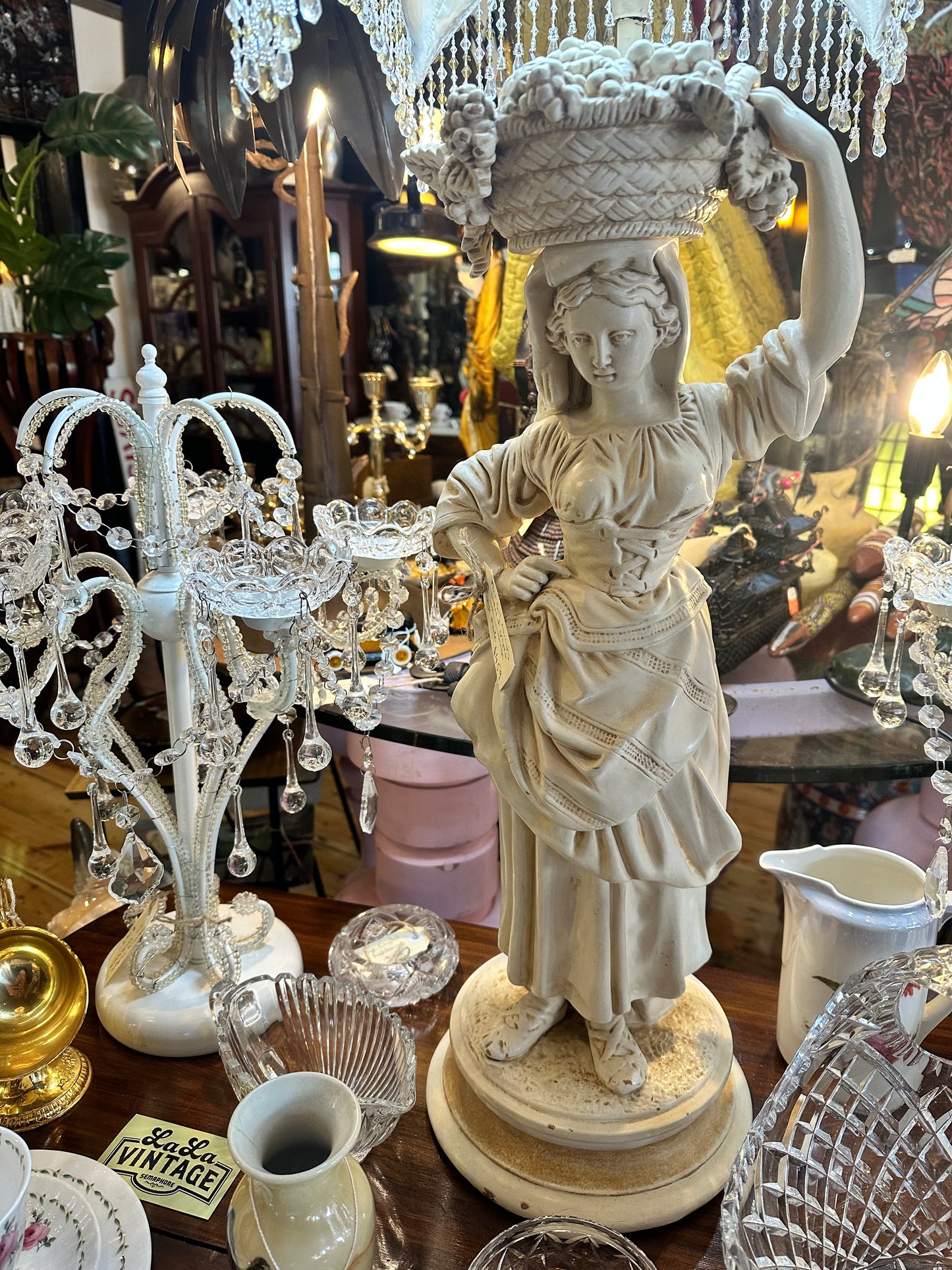 Beautiful Farm Girl Table Lamp carrying a basket of grapes