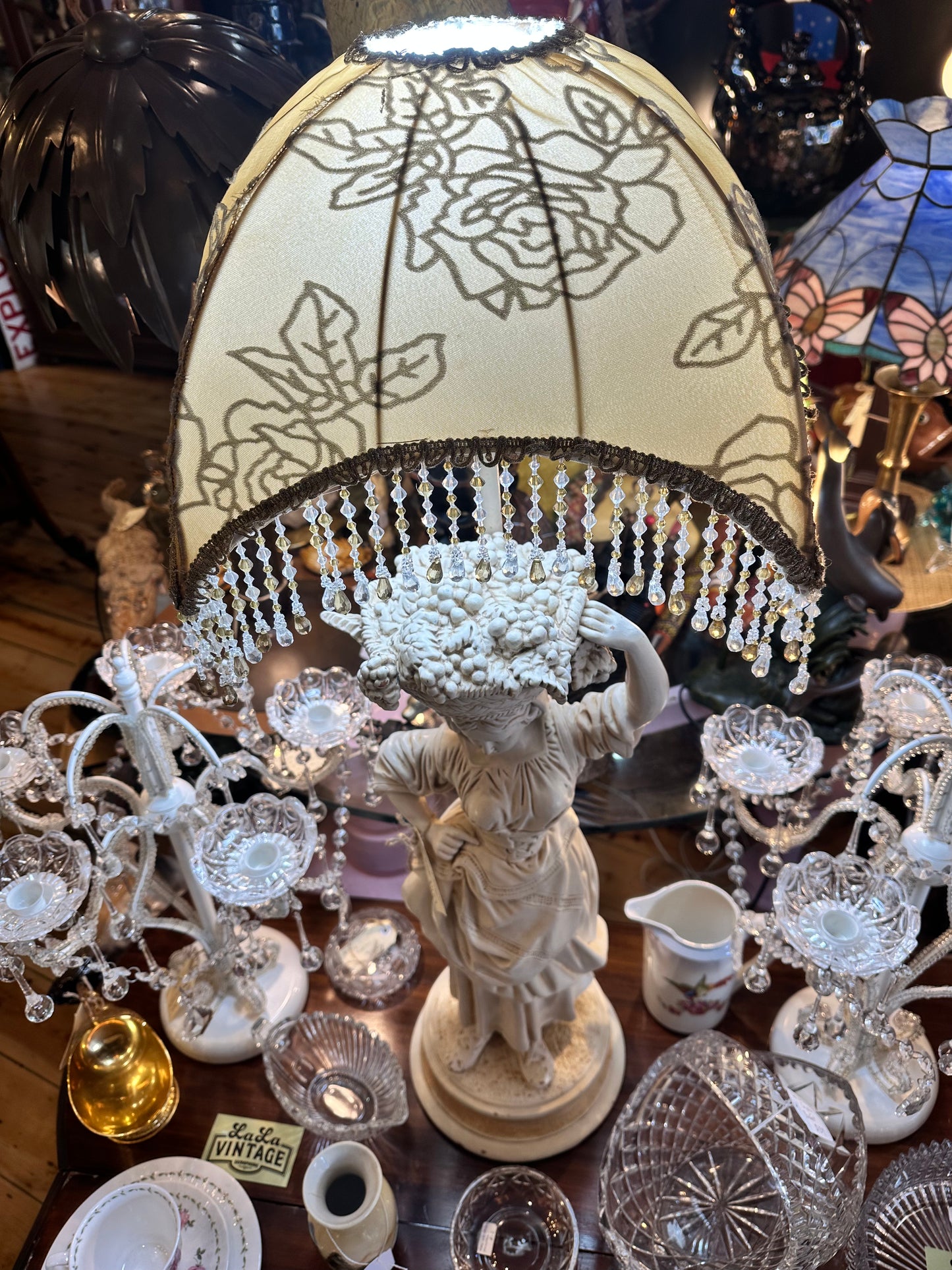 Beautiful Farm Girl Table Lamp carrying a basket of grapes