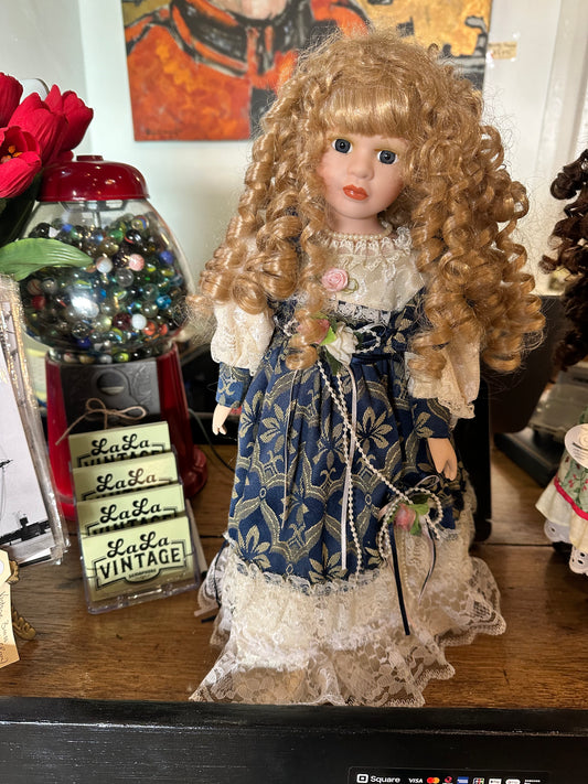 Collectable Porcelain Emerald Doll on Stand