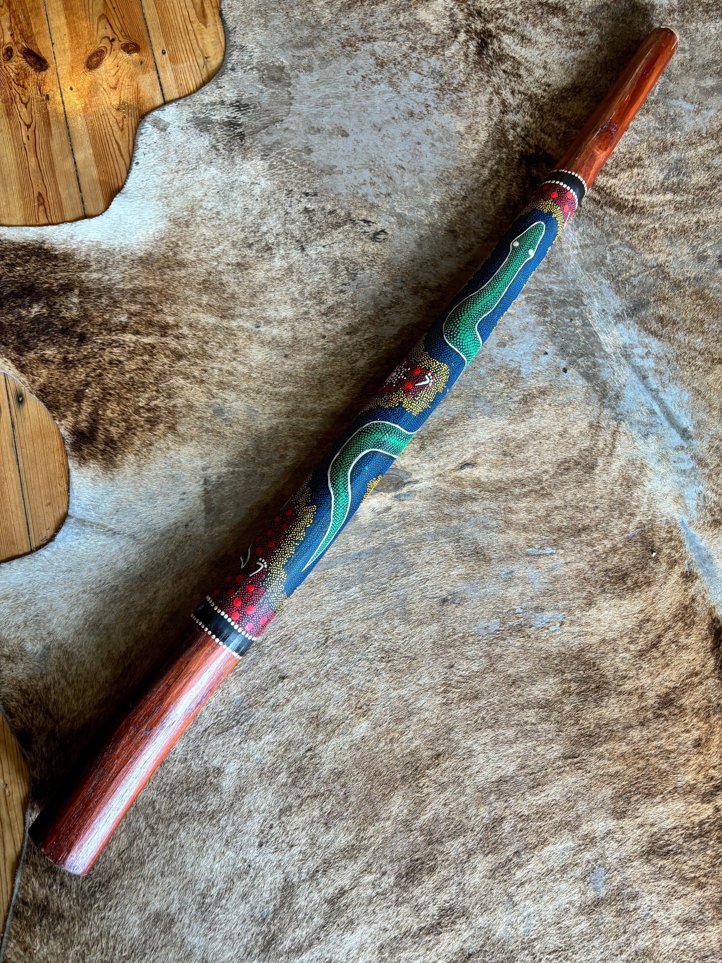 Beautiful Didgeridoo Featuring Dot Painting of Snake