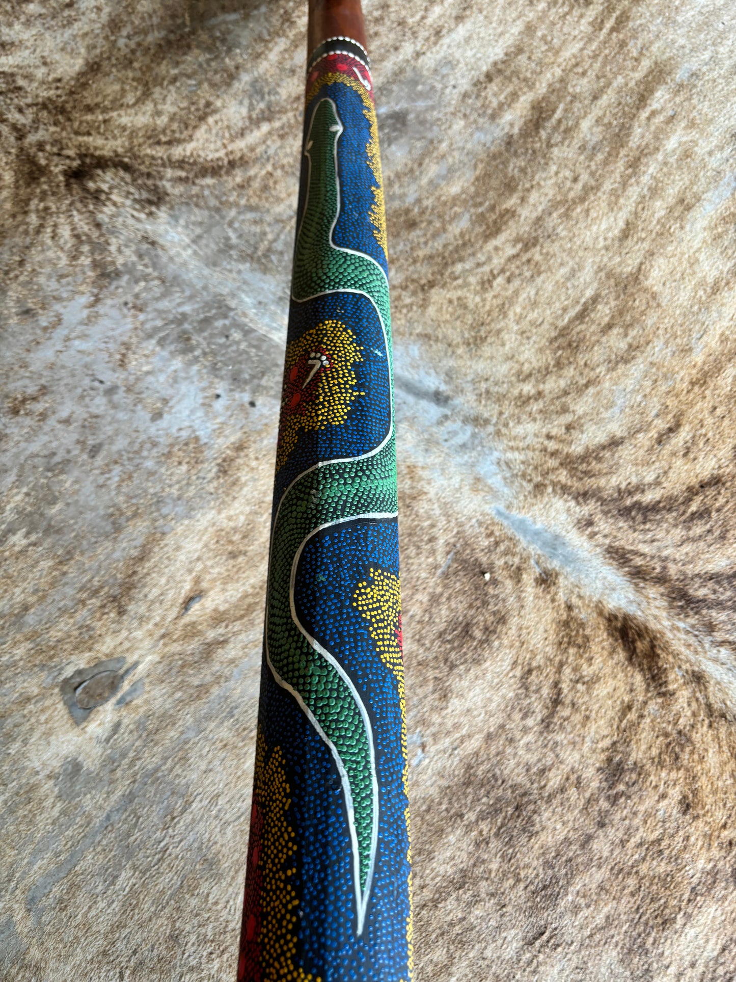 Beautiful Didgeridoo Featuring Dot Painting of Snake