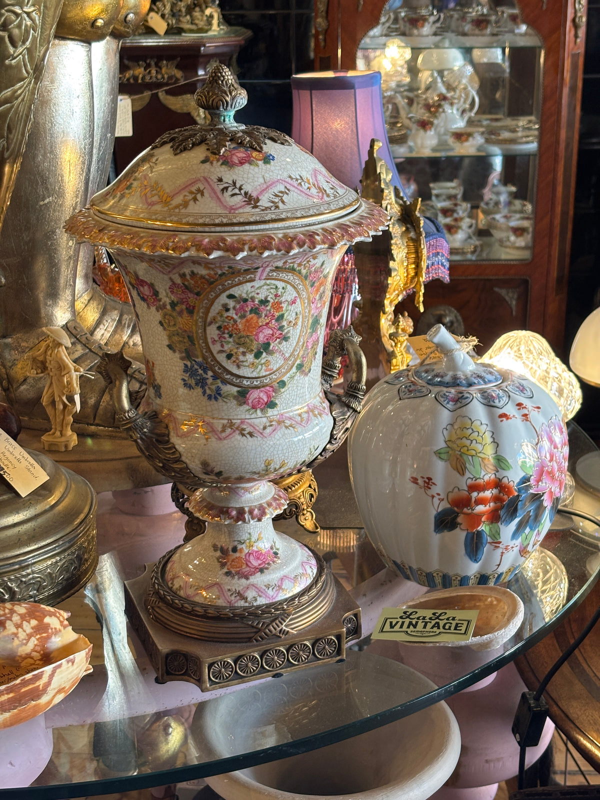 Beautiful Ceramic Urn with Brass finial handles and Stand with Floral Decoration
