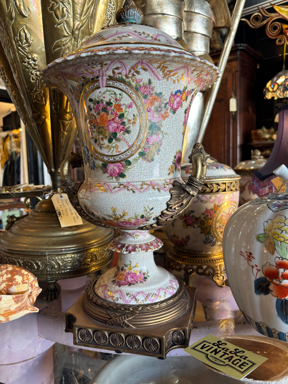 Beautiful Ceramic Urn with Brass finial handles and Stand with Floral Decoration