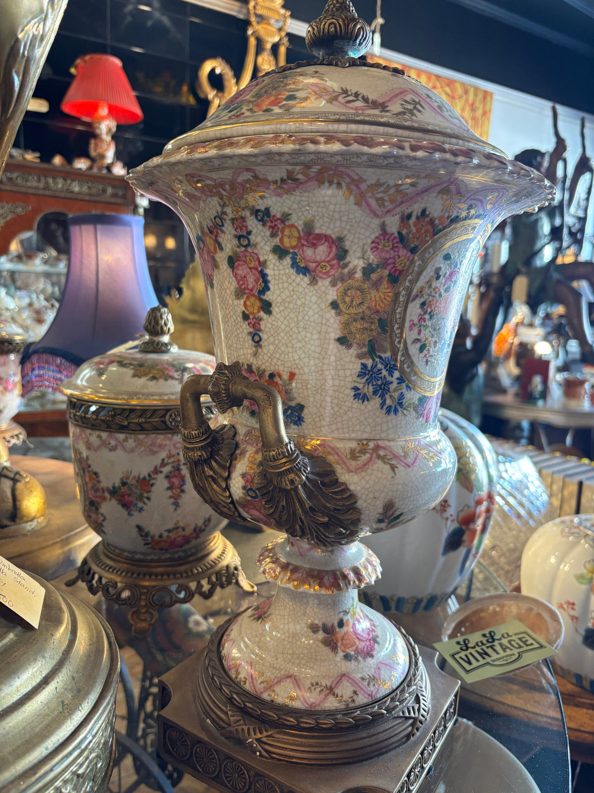 Beautiful Ceramic Urn with Brass finial handles and Stand with Floral Decoration