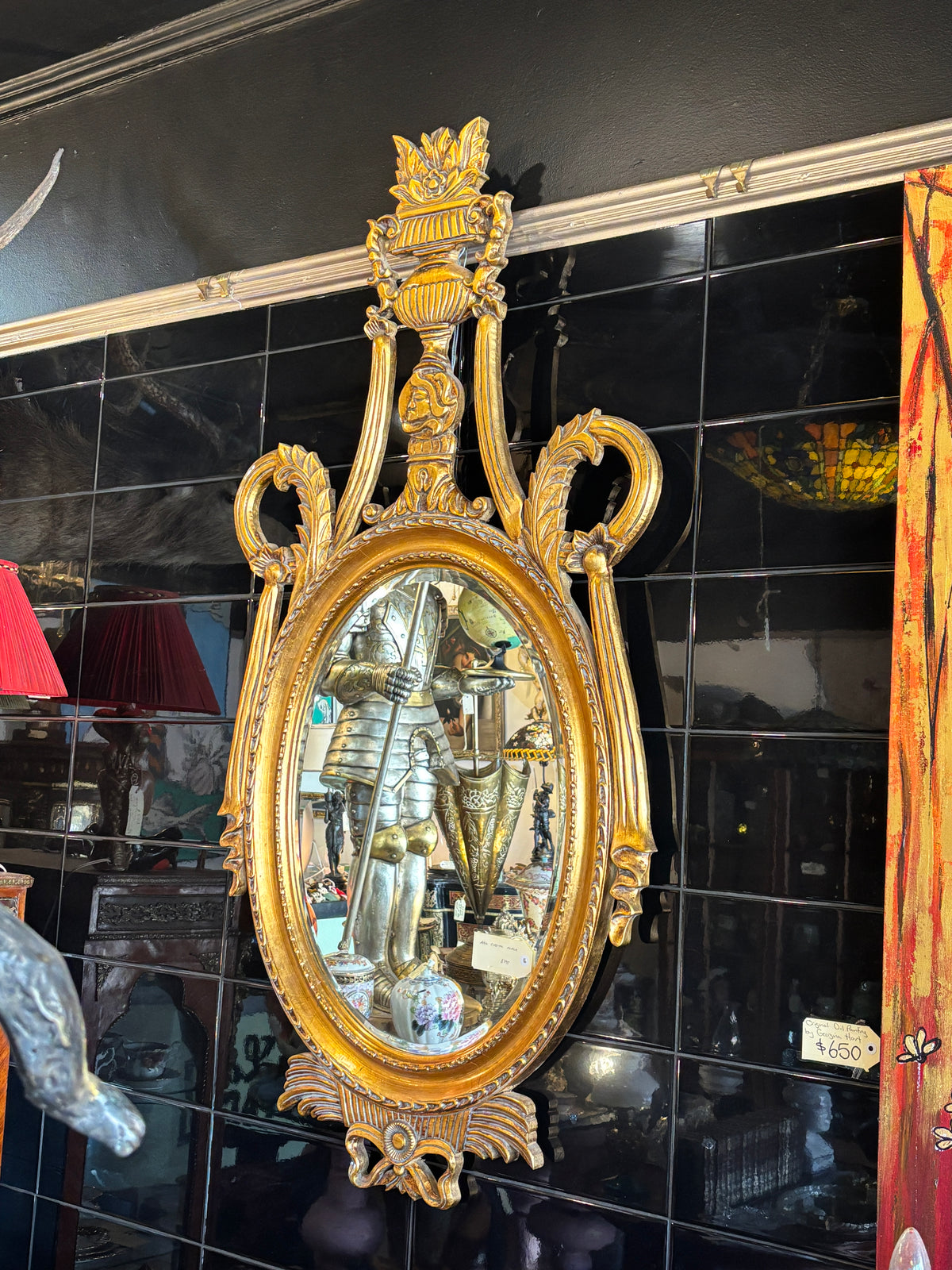 Neoclassical Style Gilt Oval Mirror with Urn Crest