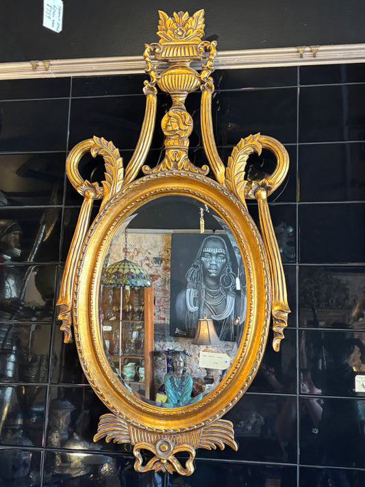 Neoclassical Style Gilt Oval Mirror with Urn Crest